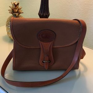 Antique Dooney & Burke all weather leather bag